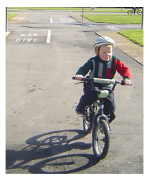 Side image - kid cycling at Marlow Park. 