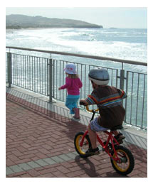 Side image - kids cycling at St Clair. 