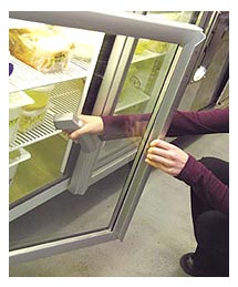 Side image - Checking fridge temperature. 