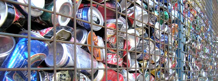 Banner image - Squashed cans for recycling. 