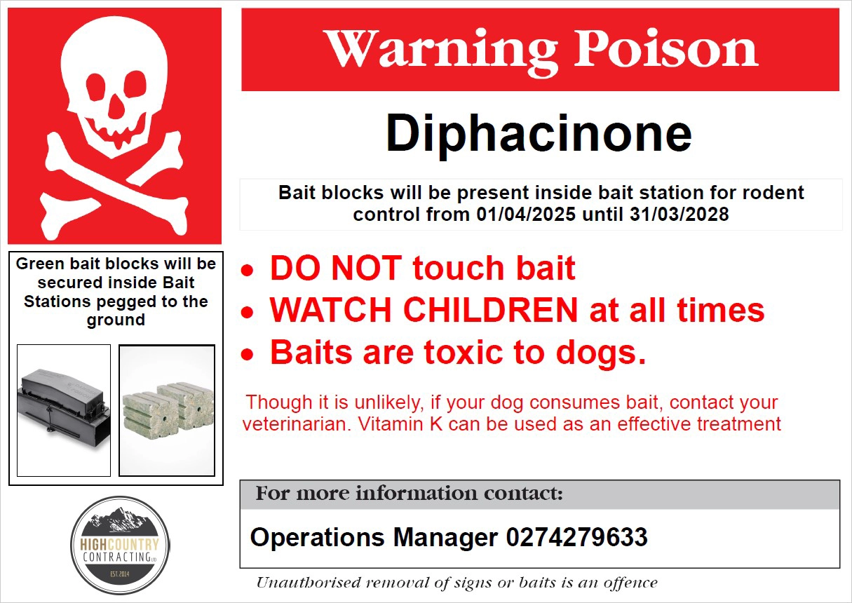 Sign with skull and cross bones warning of poison. Do not touch, watch children, bait is toxic to dogs. If consumed seek medical assistance