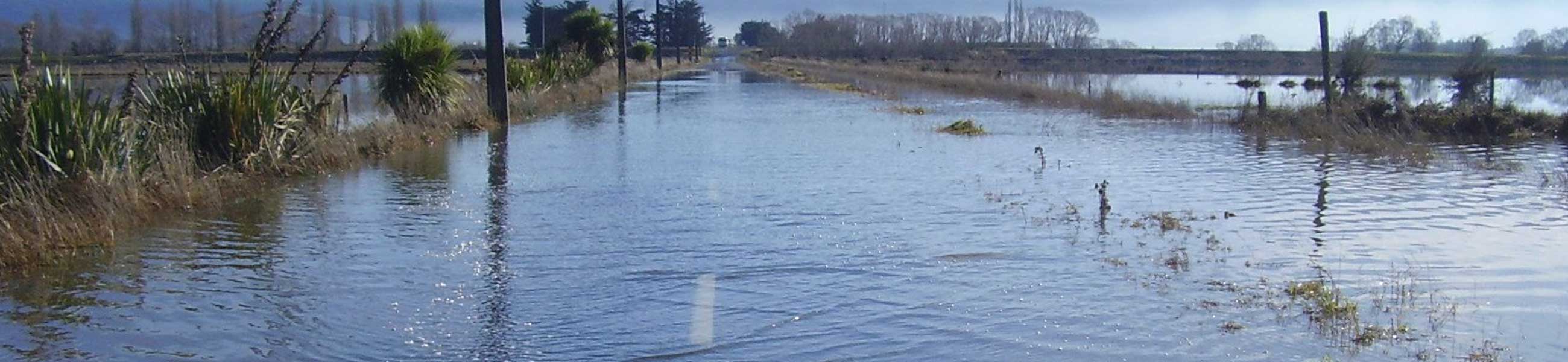 Flooding delays travel on the Berwick-Henley Road on the Taieri Valley, Dunedin
