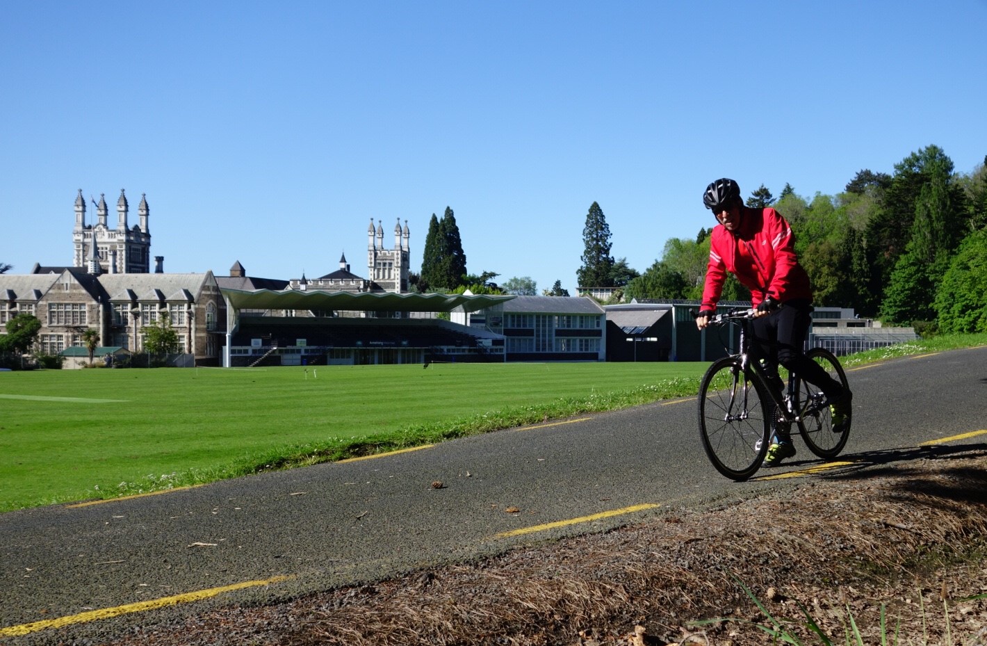 Cycling past Otago Boys High School