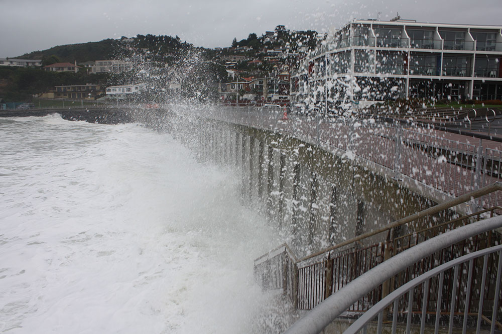 The St Clair sea wall being impacted by waves