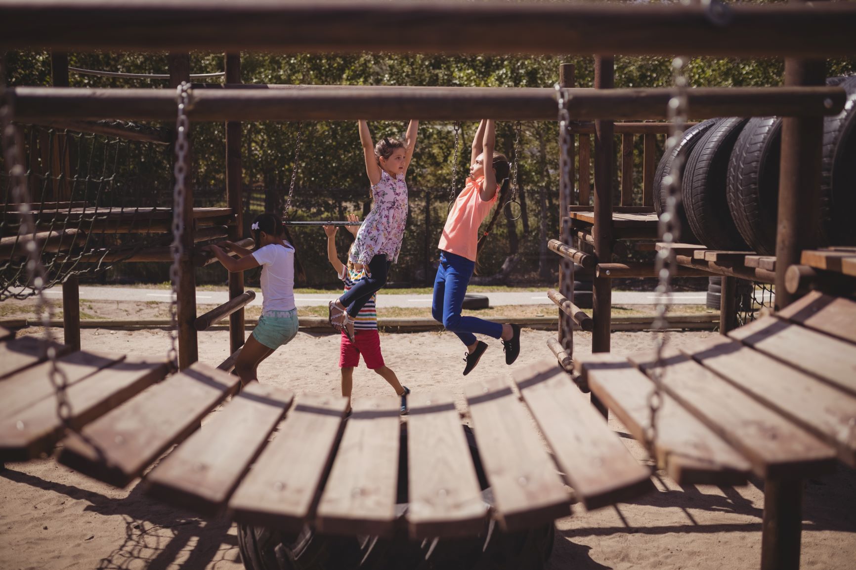 Two girls on jungle gym