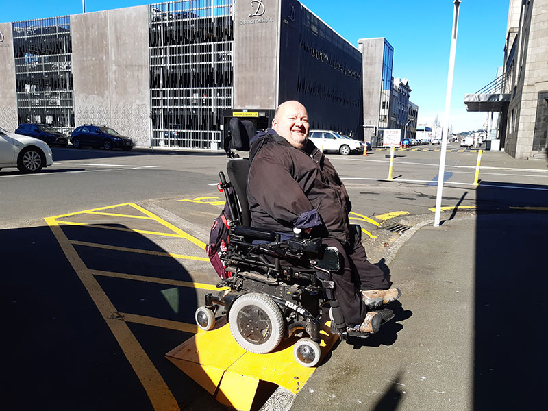 Wheelchair person in ramp.